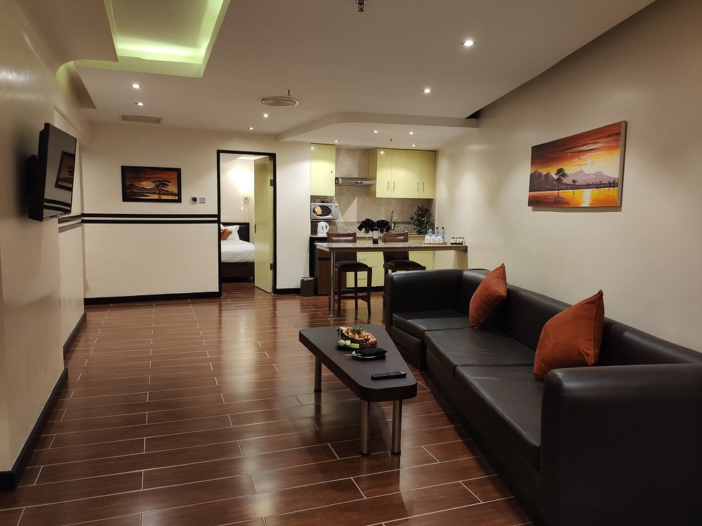 The spacious living area inside the Family Suite